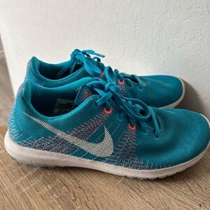 Nike Teal Knit Running Sneakers with Pink Stitching and White Swoosh